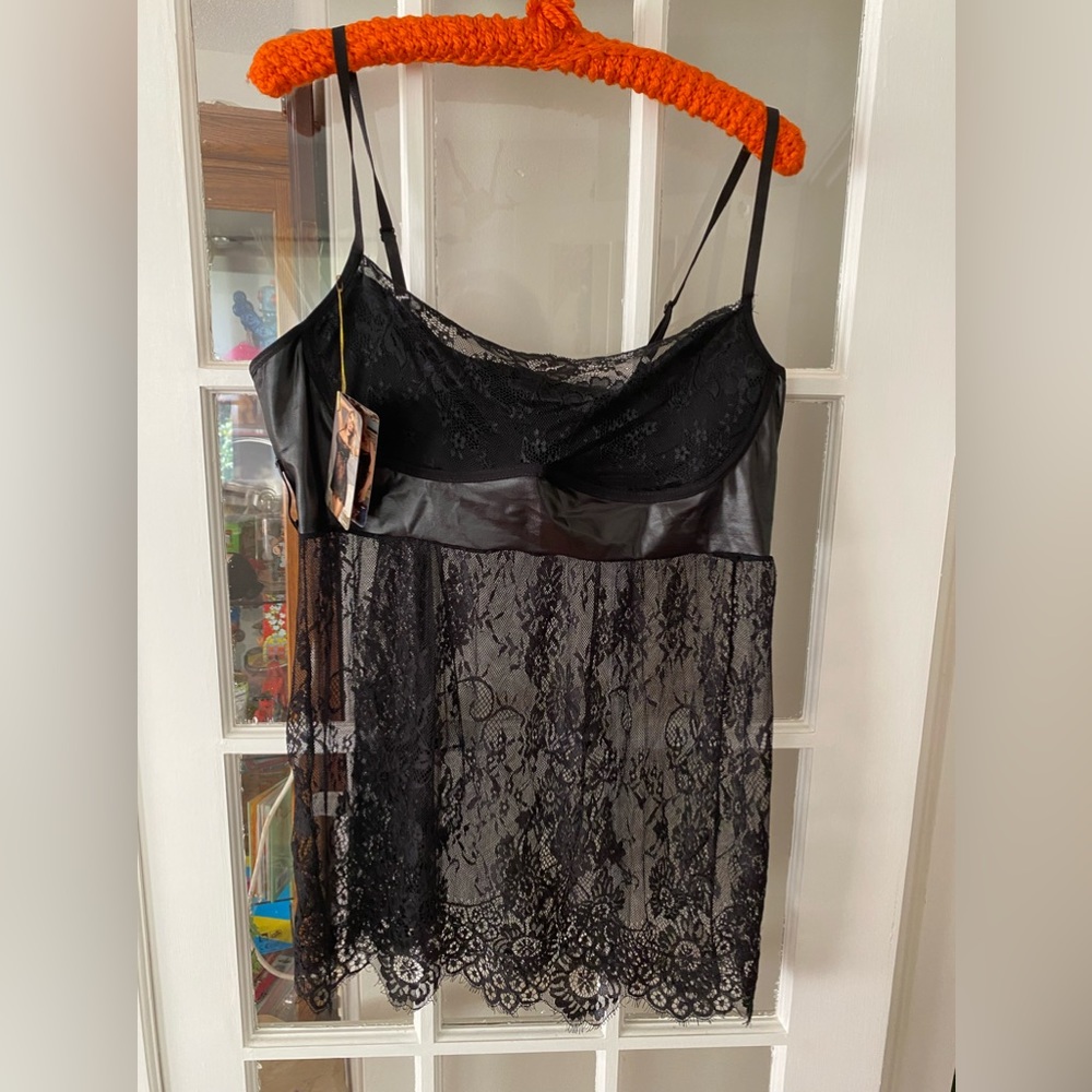 NWT black lace teddy. Size 16/18 adjustable straps. Hook and eye closure.